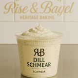 Dill-flavored cream cheese from Rise & Bagel, blended with herbs for a fresh savory spread.